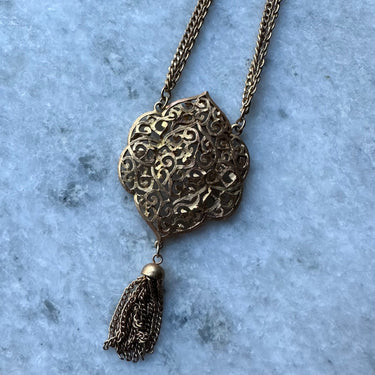 Gold Medallion With Tassle Pendant Bloomers and Frocks